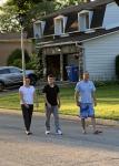 Yarislav walking(!!!) with his parents Maxim and Yevgenia